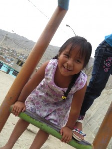 This adorable little chica’s name is Jaqui who was getting ready to bravely take on the monkey bars in sports class. 