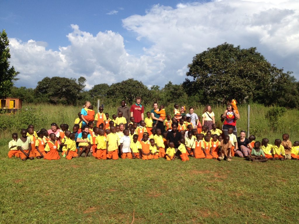 The crew with the local elementary school on the Ziwa Rhino Sanctuary. 
