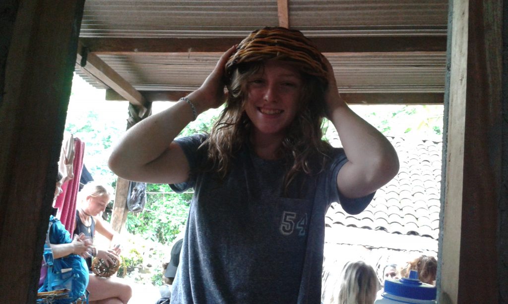 Hannah with her basket / hat.