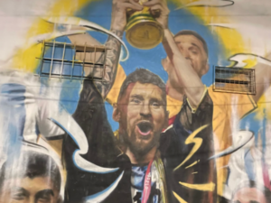 A recent mural of a victorious Messi, following the world cup