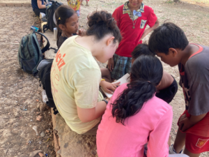 Drawing with school kids at Floating village school