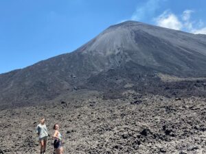 volcano hiking gray blue two students
