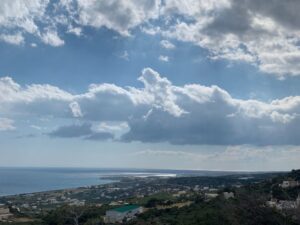 ocean clouds coast greece