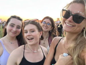 at lollapalooza concert four girls selfie