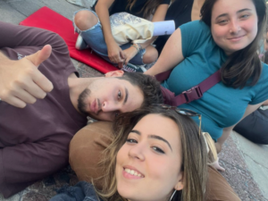 friends selfie lying down