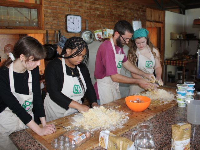 students making pasta in italy