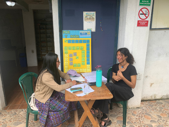 student and teacher in spanish lesson
