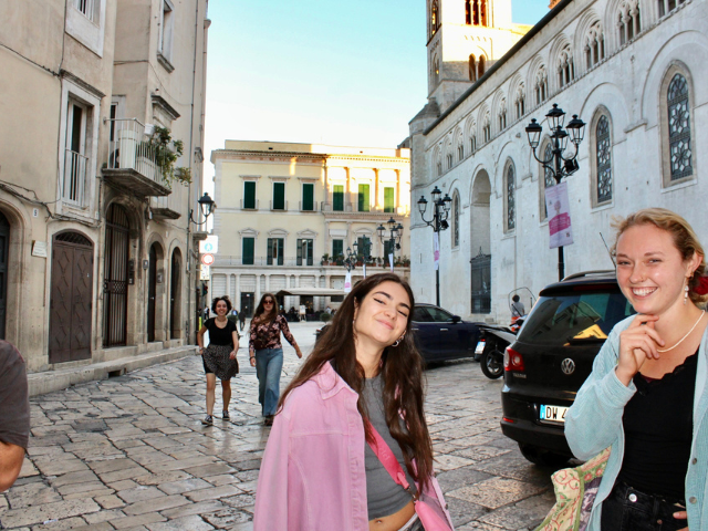 students posing in rome streets
