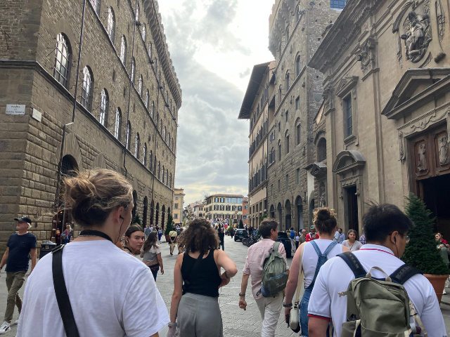 students wandering through florence