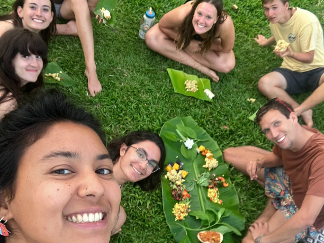 student picnic on palm frond