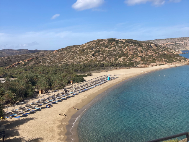 shoreline of beach and blue ocean in greece