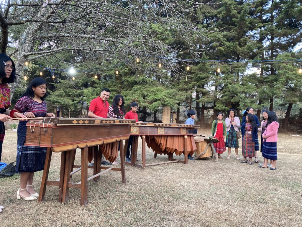 locals playing a marimba instrument